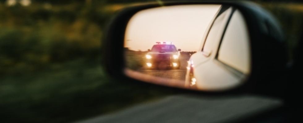 police in side mirror