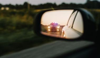 police in side mirror