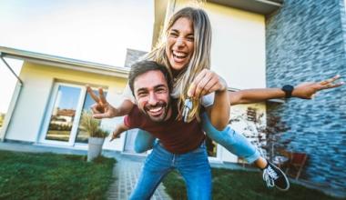 happy couple with keys
